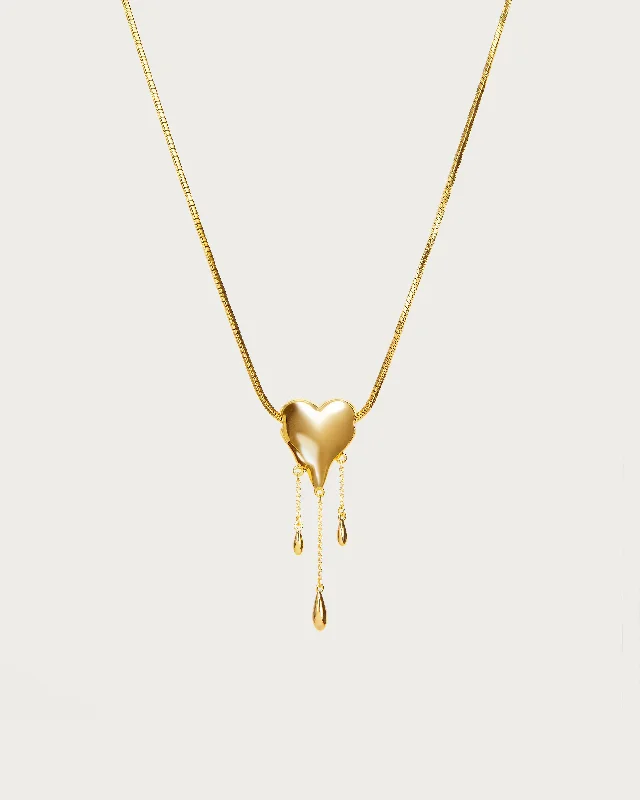 Venom’s Golden Drip Heart Necklace